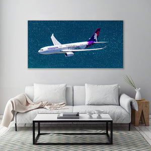 A large wall art print depicting a Hawaiian Airlines airplane flying through a starry night sky.