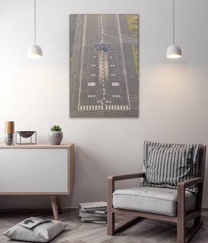 a large airplane on a runway, with a minimalist and modern interior design in the background.