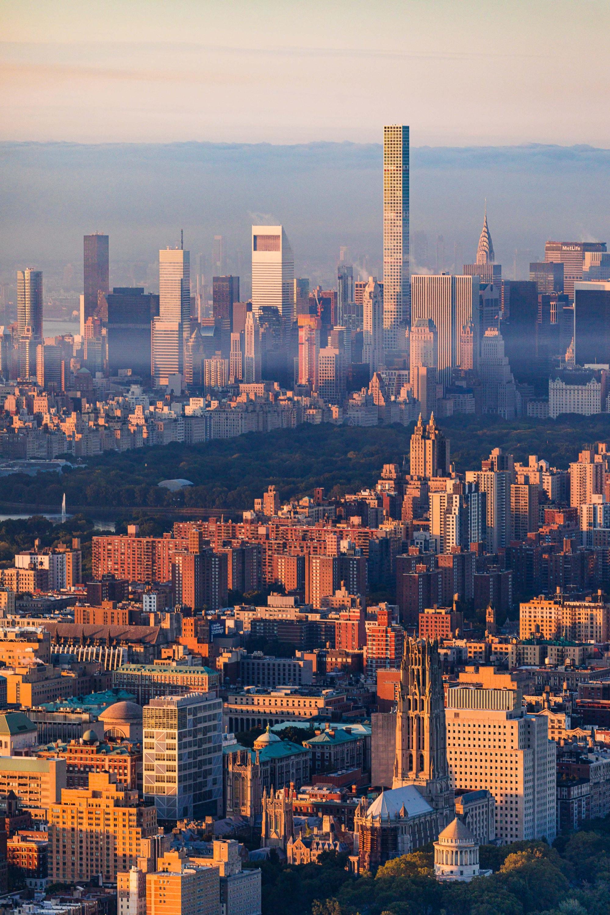 a view of a city with tall buildings